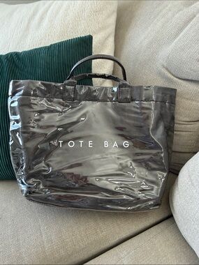 Brown Glossy Tote Bag with 'TOTE BAG' Print
